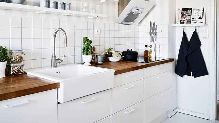 white handles on white cabinets