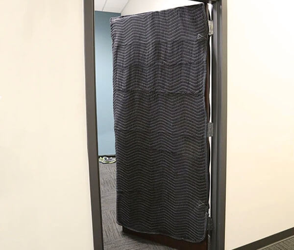 soundproof a door with blankets